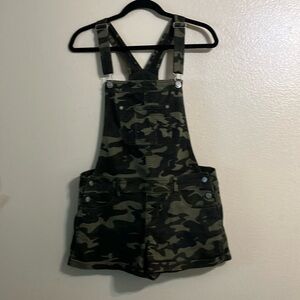 Camouflage green overalls 
Size 10 
Used 
Fairly New